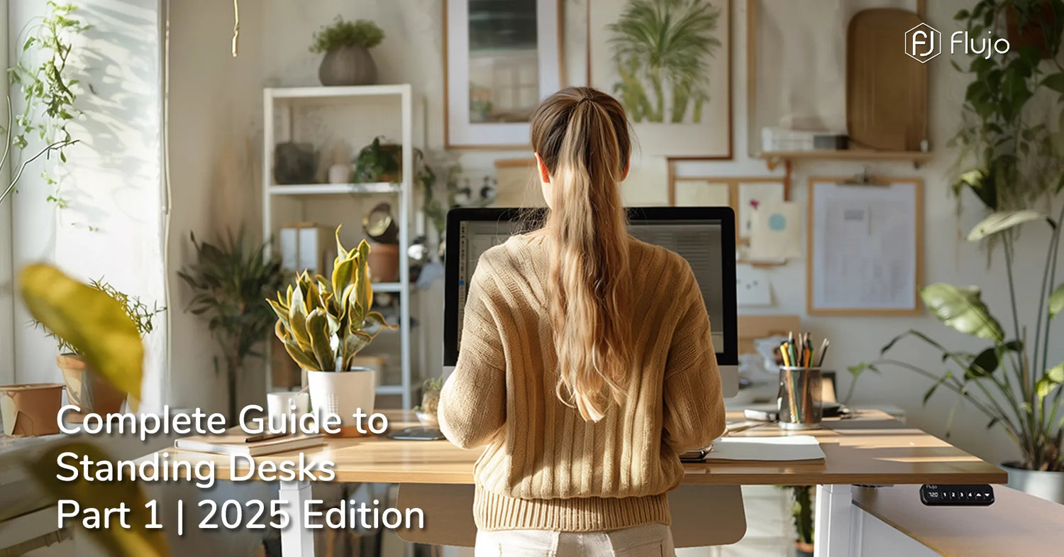 Woman working on a dual motor standing desk in a well-lit ergonomic home office filled with indoor plants, featuring Flujo’s smart height adjustable desk – Singapore 2025 standing desk guide