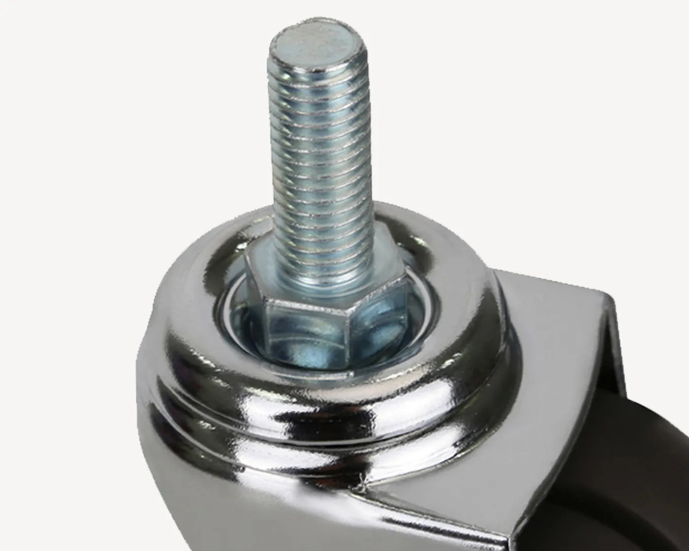 Top view of a caster wheel's attachment point, featuring a shiny metal housing and threaded stem for secure mounting.