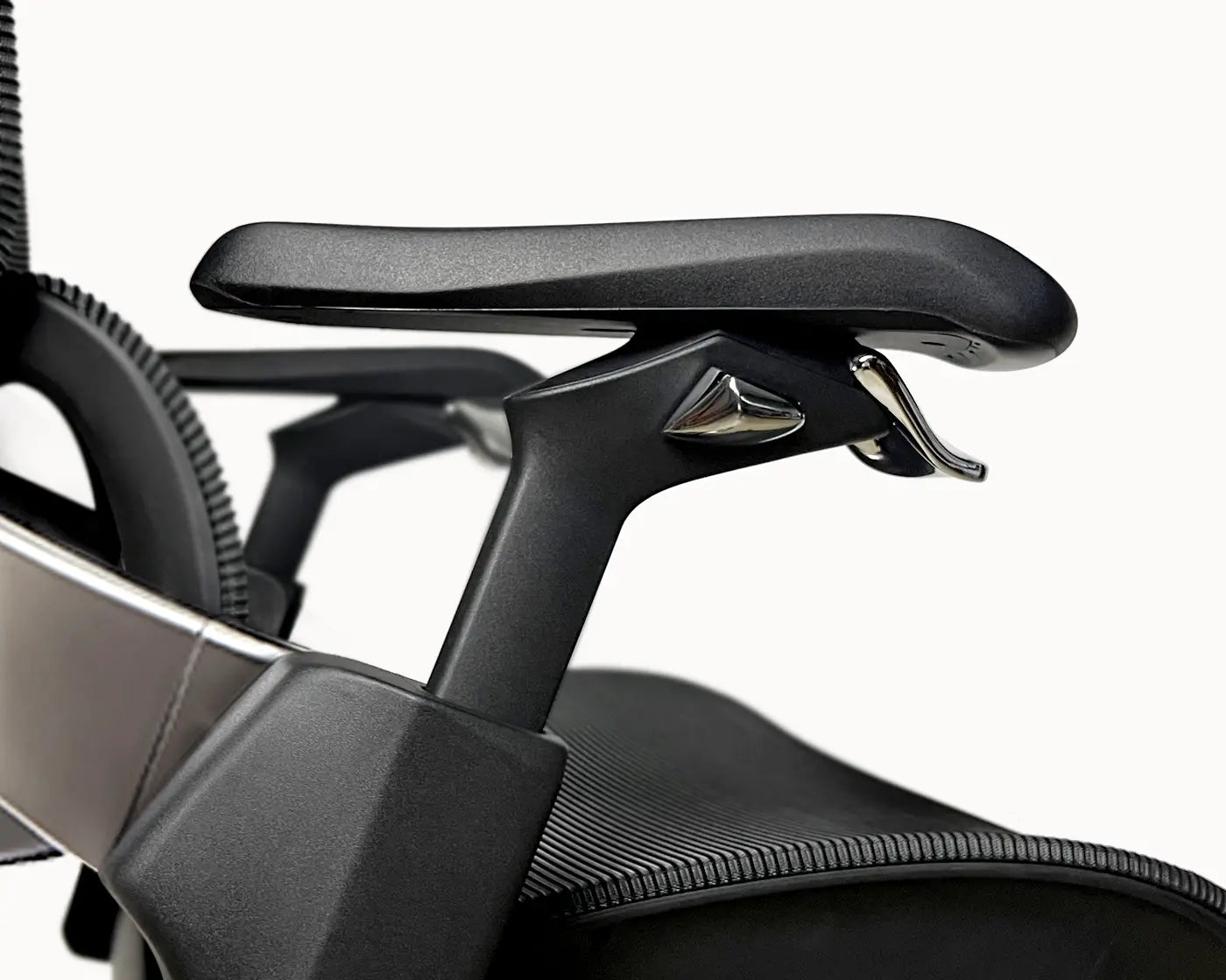 Close-up of the armrest of the Flujo Elli Ergonomic Chair, featuring its adjustable settings for enhanced comfort.