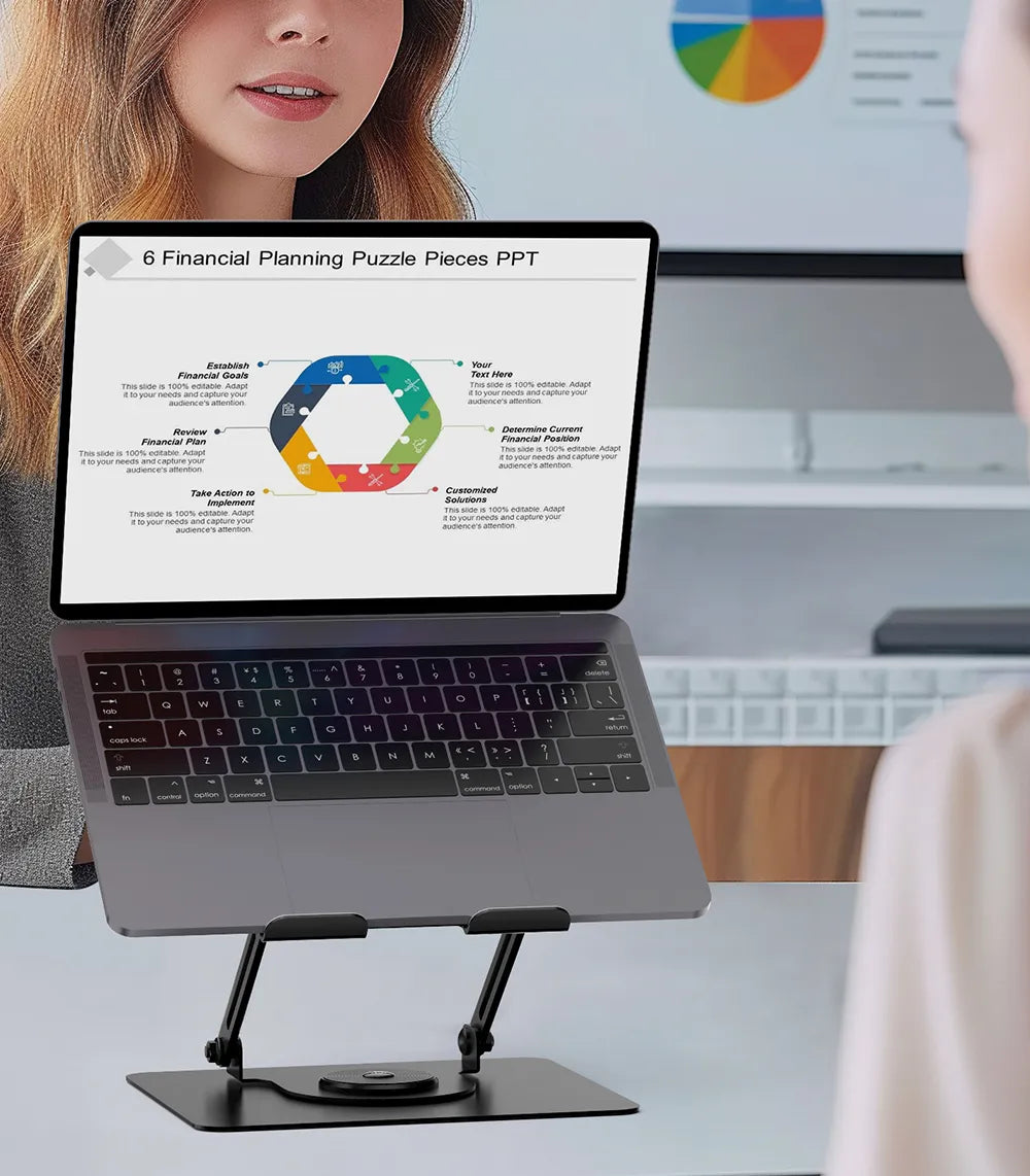 FlexStand Pro Laptop Stand by Flujo in a work setup with a laptop