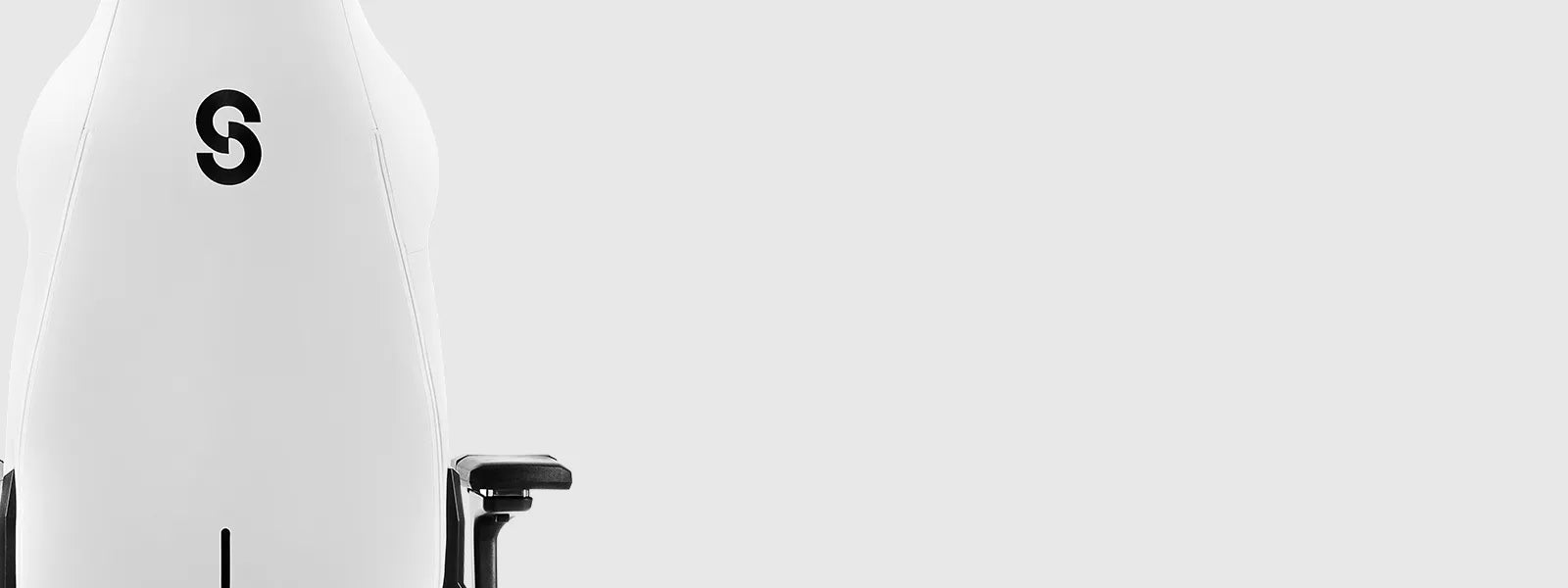 Back view of the white SYCLONE PRO gaming chair with a black 'S' logo.