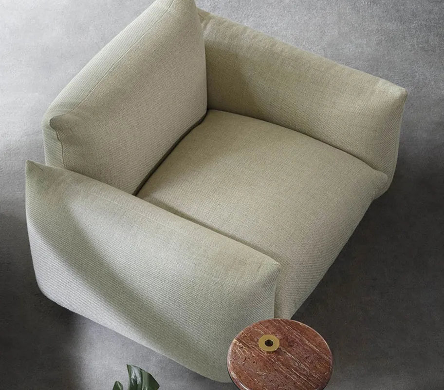Sora Single Seater placed in a stylish lounge, emphasizing its elegance and comfort.