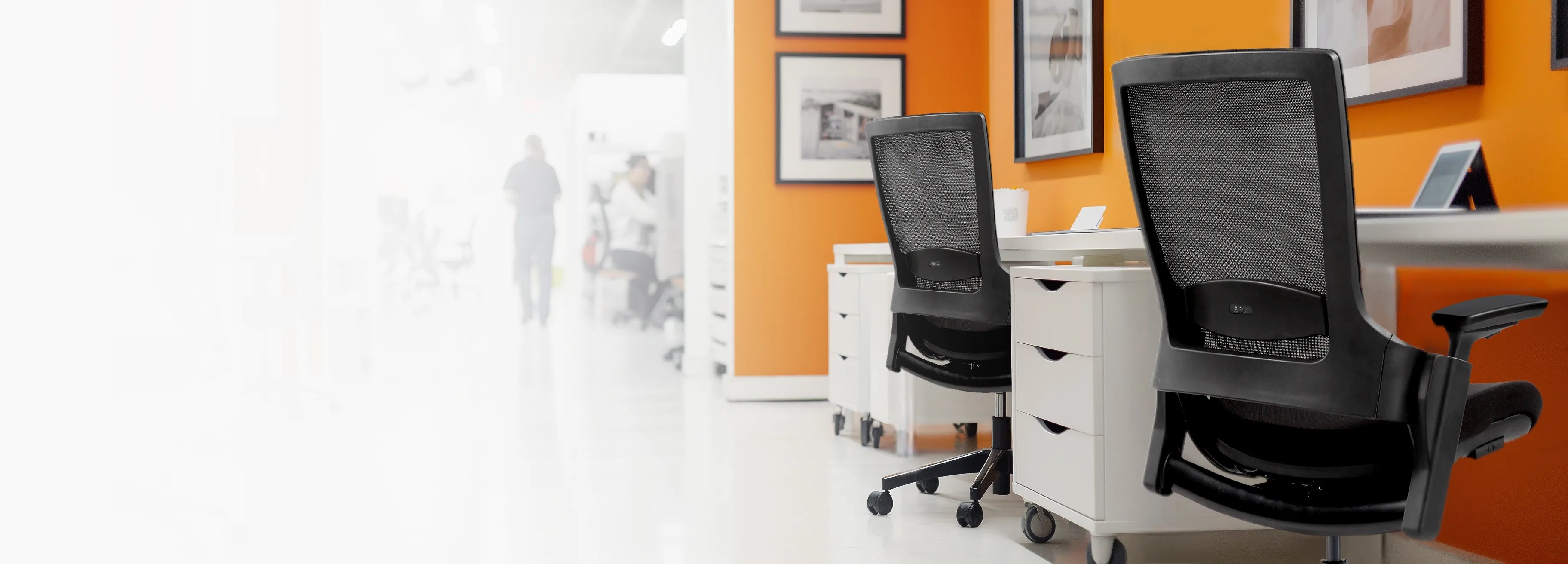 Ergonomic office chairs in a brightly colored office space