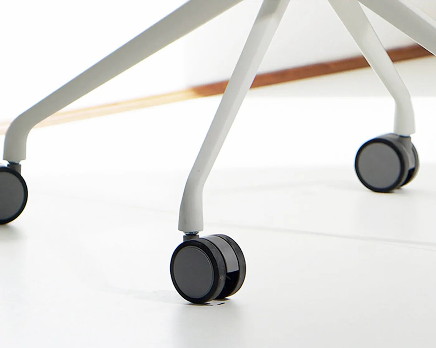 Silent 360 degree caster wheels on Luna office chair for smooth and easy movement in office and home