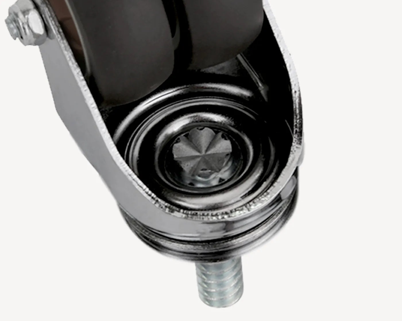 Close-up view of the inner mechanism of a caster wheel, showcasing the detailed construction and sturdy metal bolt.