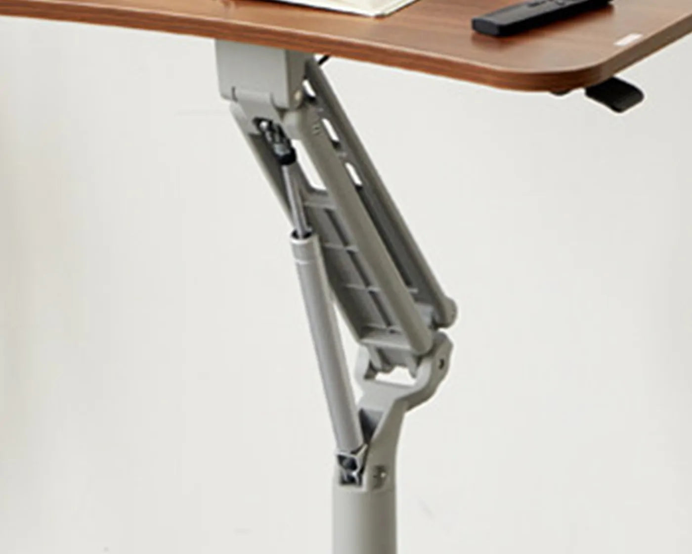 Compact workspace table with sturdy metal frame designed for stability in small spaces