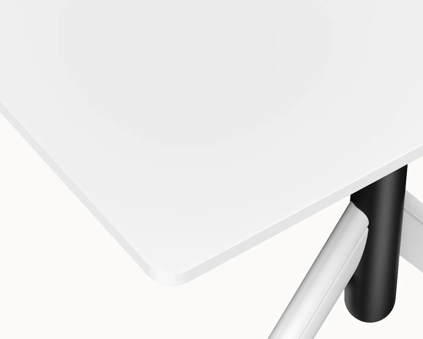 Close-up view of the white surface on the Flujo TriFlex Desk.