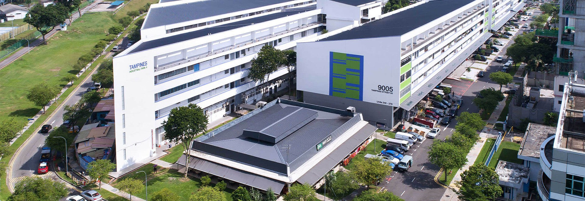Aerial view of Flujo's corporate headquarters in Tampines Industrial Park, Singapore, showcasing the company's modern infrastructure.