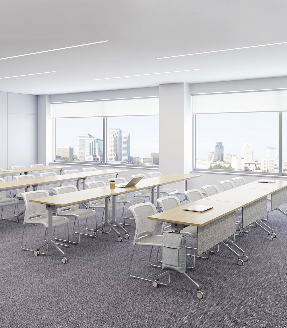 Modular training tables configured for collaborative team workspace and group discussion