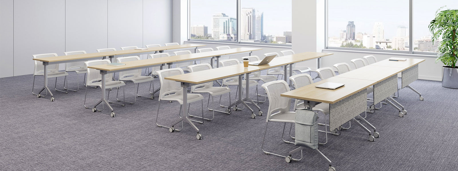 Modular training tables configured for collaborative team workspace and group discussion