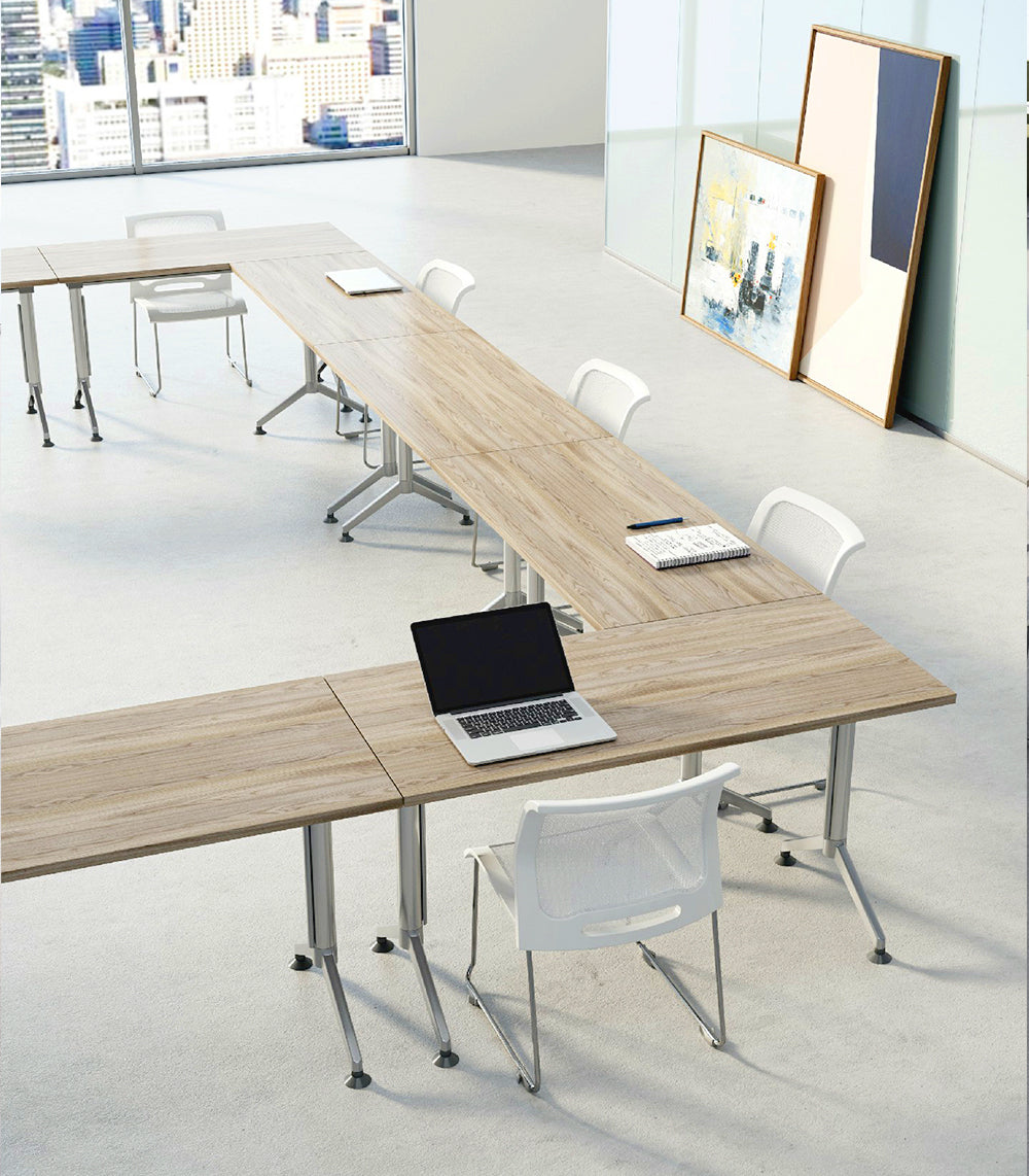 Office training table arranged for meeting and collaborative workspace setup