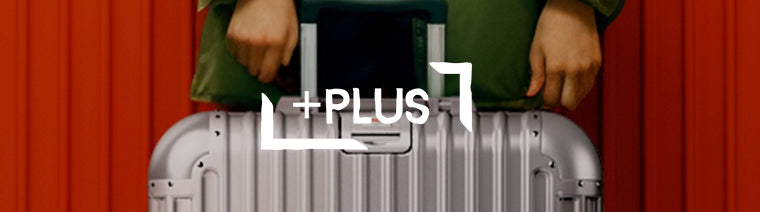 PLUS brand suitcase with integrated technology compartment for on-the-go connectivity in Singapore.