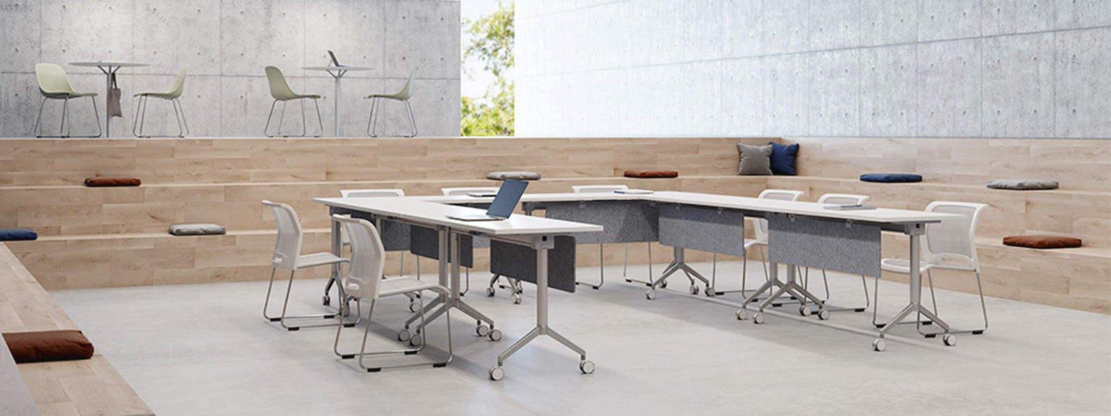 Training tables arranged for seminar and workshop setup in a modern training room