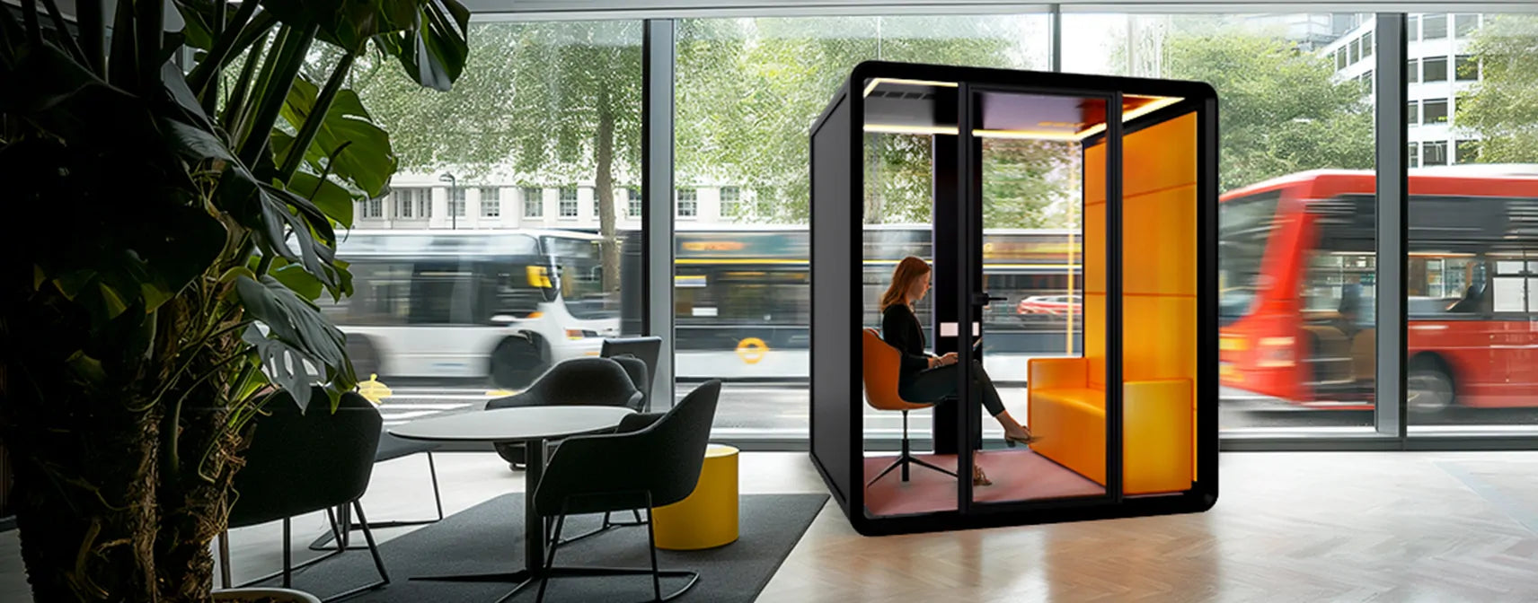 Flujo Nexus Acoustic Office Pod in a Modern Singapore Workspace with Urban View