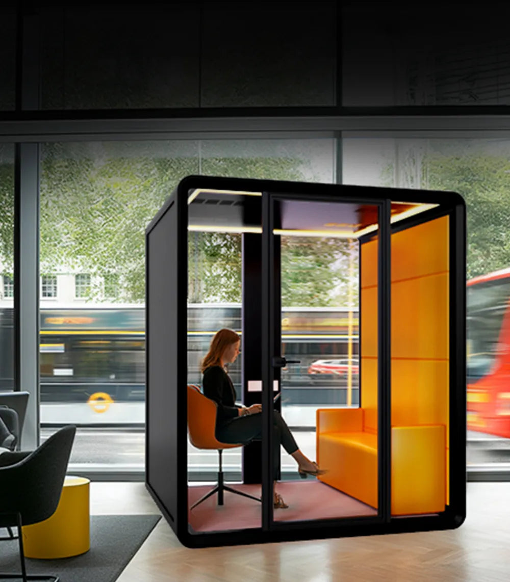 Flujo Nexus Acoustic Office Pod in a Modern Singapore Workspace with Urban View