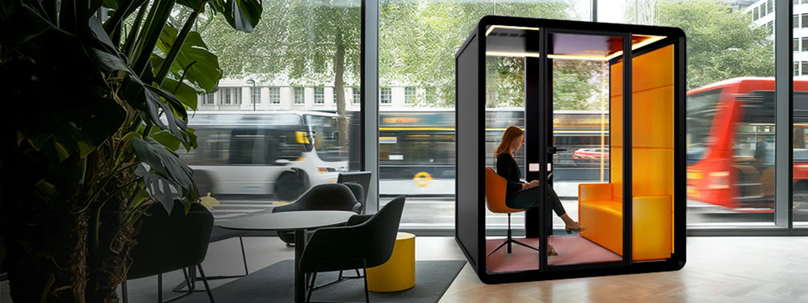 Flujo Nexus Acoustic Office Pod in a Modern Singapore Workspace with Urban View