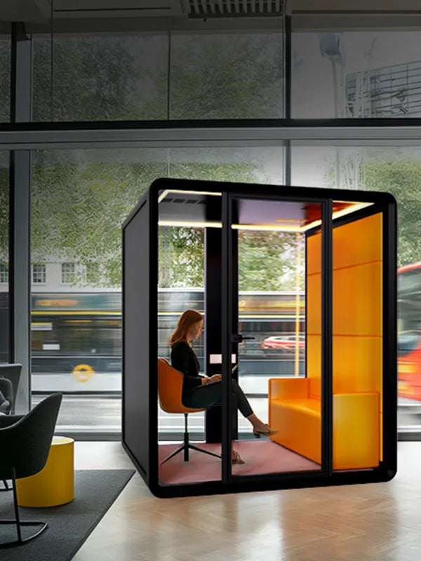 Flujo Nexus Acoustic Office Pod in a Modern Singapore Workspace with Urban View