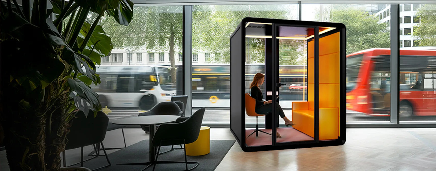 Flujo Nexus Acoustic Office Pod in a Modern Singapore Workspace with Urban View