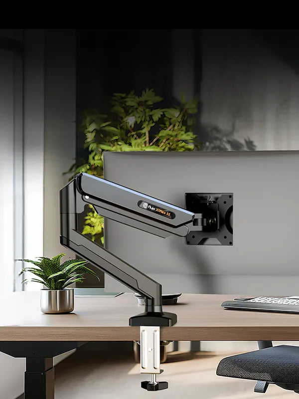 XTFlex S5 Single Monitor Arm mounted on a standing desk for ergonomic workspace in Singapore
